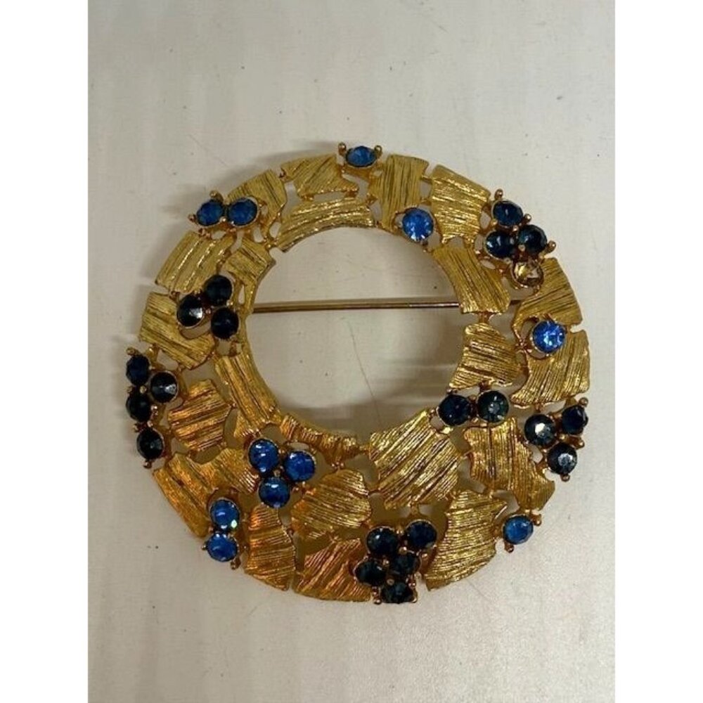 Vintage Unsigned Gold Tone Blue Rhinestone Round Brooch